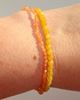 solsten, orange, gylden, forgyldt, smykker, halvædelsten, armbånd, elastikarmbånd, accessories, perler, beads, ædelsten,